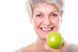 Older woman with dentures in Dallas