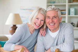 an older couple showing off their smiles