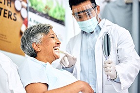 Dentist and patient talking during consultation