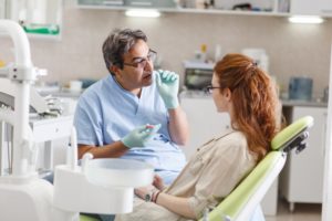 woman learns about cosmetic dentistry myths